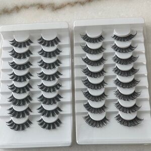 Two sets of strip lashes 8 strips each. Brand new